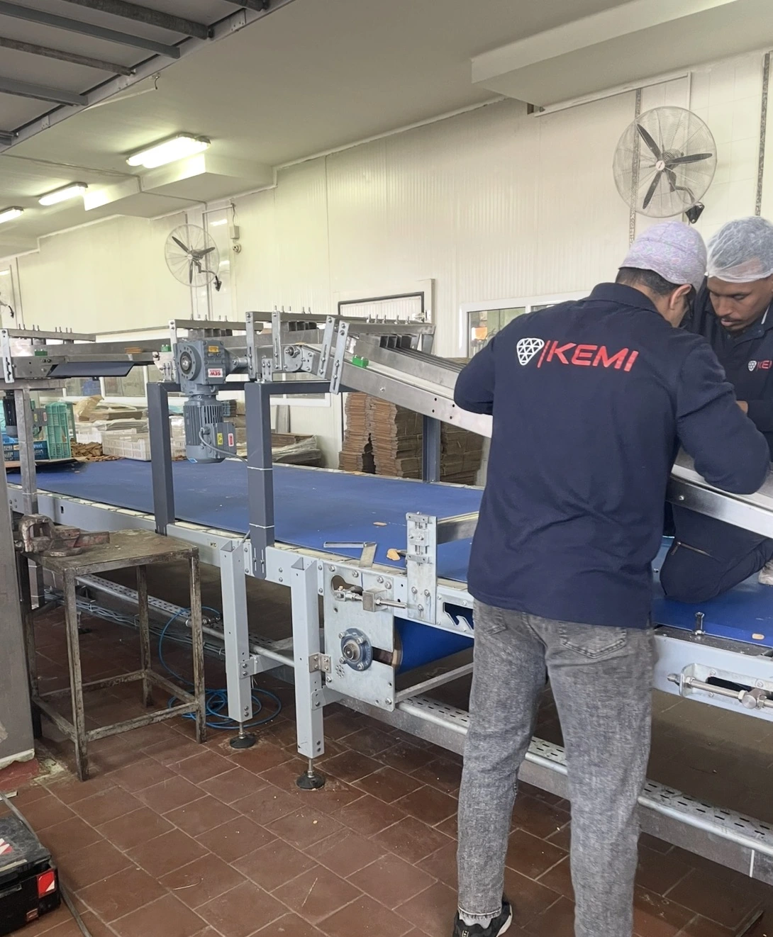 Frame and drive details during biscuit feed conveyor installation