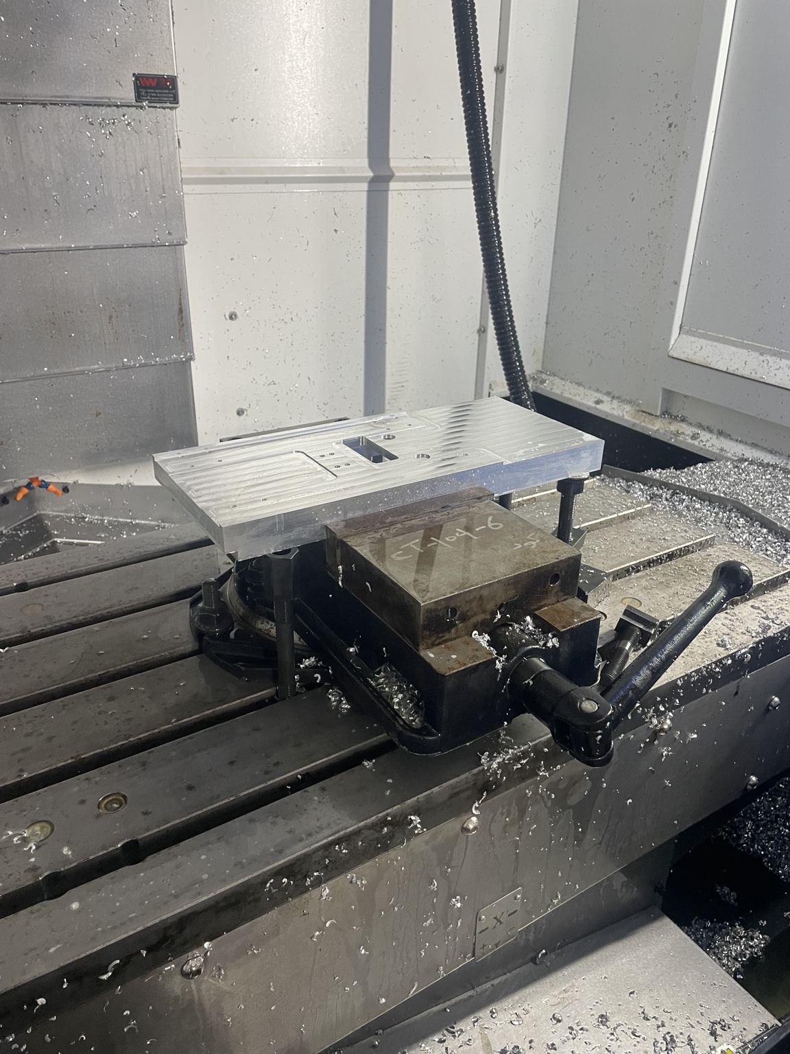 Workpiece secured in the milling machine vise